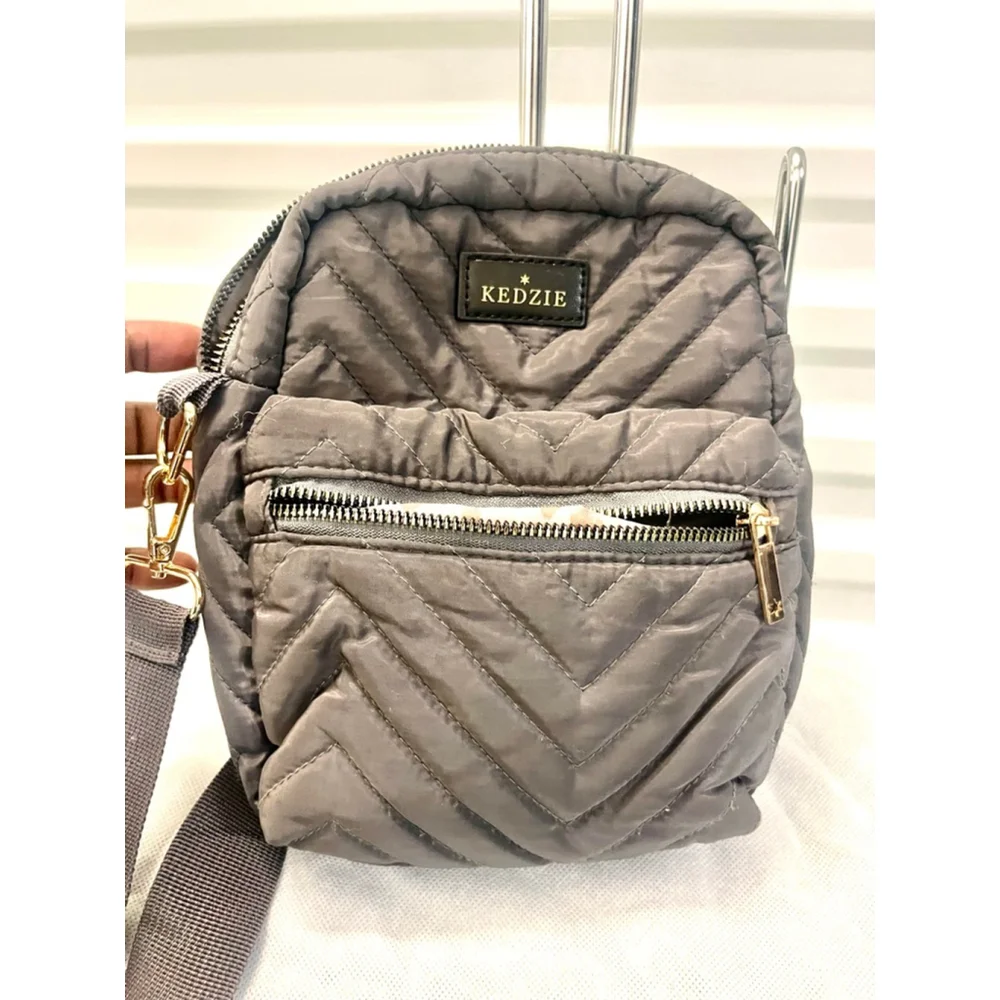 Kedzie Cloud 9 quilted puffer convertible sling bag in gray